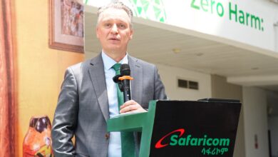 Safaricom Ethiopia CEO Wim Vanhelleputte speaking at a podium during a company event.