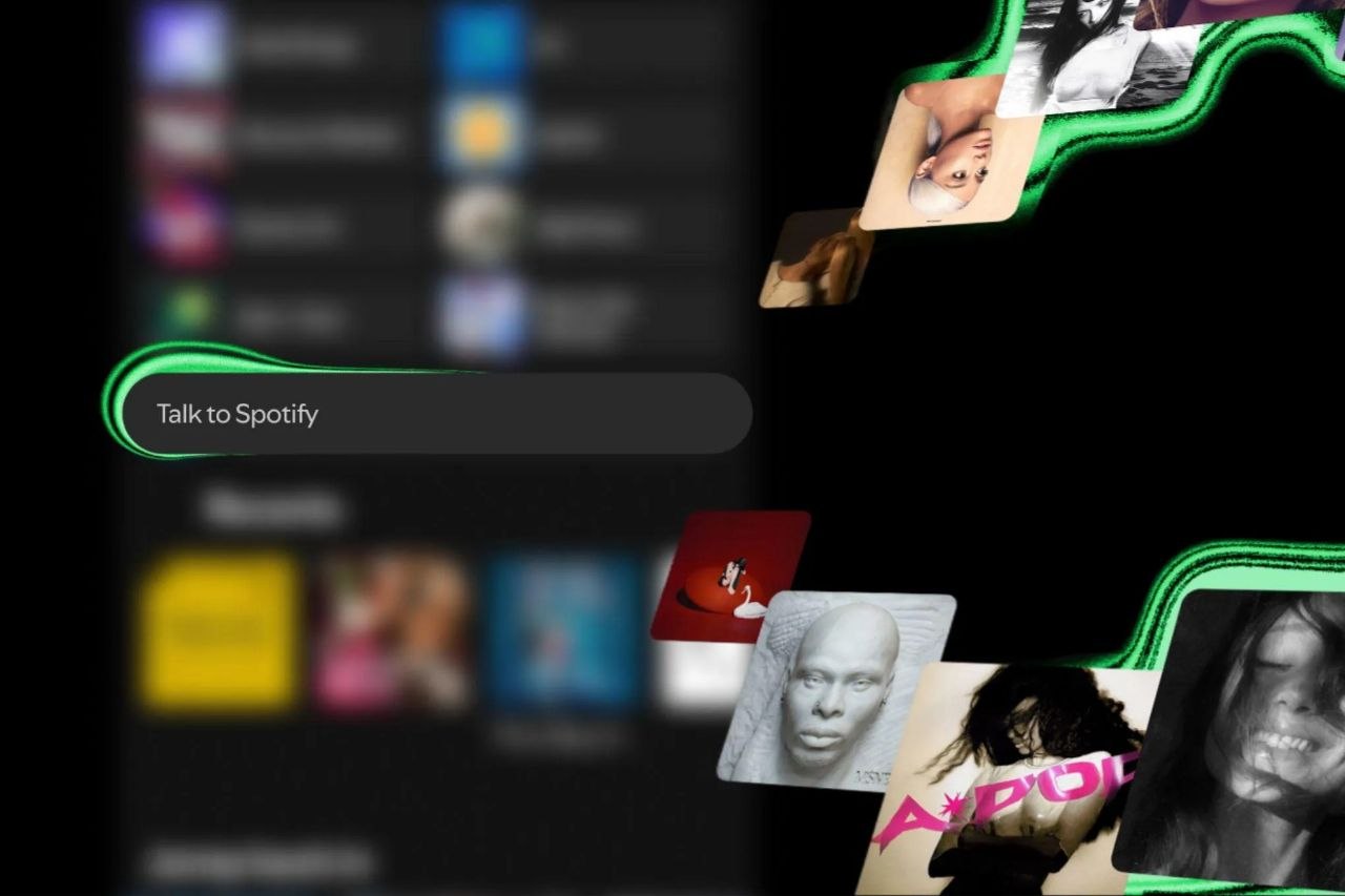 Spotify's Talk to Spotify conversational AI interface displayed on the mobile app with a text prompt and floating album artwork representing music discovery.
