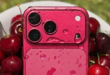 Red iPhone with triple-camera system representing Apple's expanded 2026 iPhone launch plans, including its first foldable smartphone.
