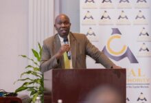 CMA CEO Wyckliffe Shamiah speaking at a Capital Markets Authority event announcing new unit trust fund approvals and expanded regulated investment products in Kenya.