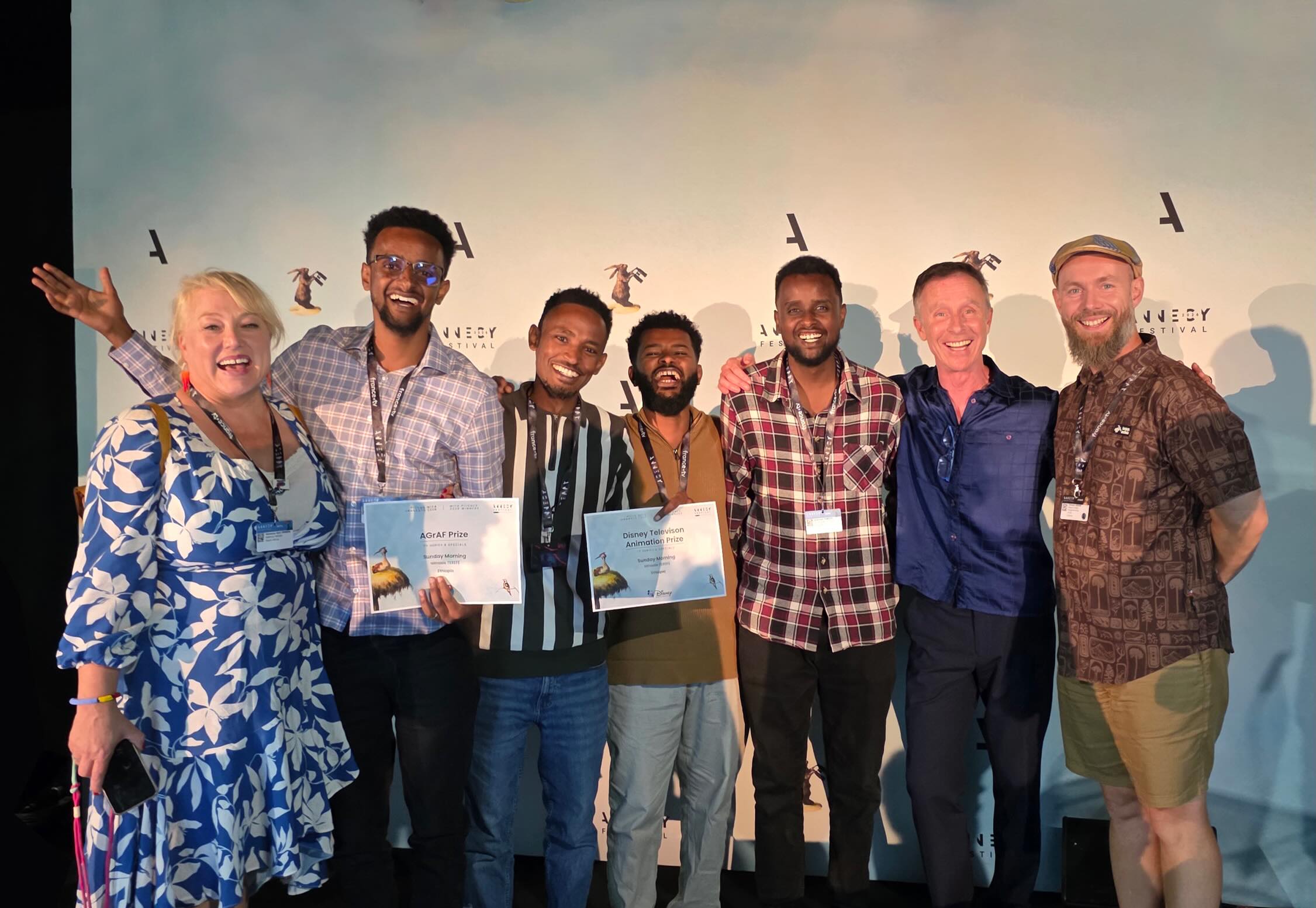 Behagerlij Studio team members celebrate with awards at Annecy's MIFA after Sunday Morning earned Disney Television Animation and AGrAF recognition during Ethiopia's first appearance at the international animation market.
