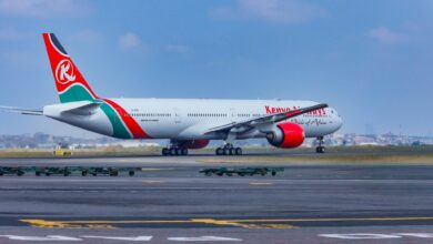 Kenya Airways Boeing 777-300ER taxis at Jomo Kenyatta International Airport after returning from a decade-long lease ahead of scheduled Nairobi-London Heathrow service.