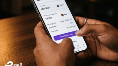 Smartphone displaying the eZi Remit app for a South Africa to Kenya money transfer powered by Mastercard Move.