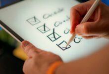 Person completing a digital consent checklist on a tablet before sharing personal information with an online service.