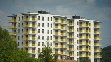 A multi-storey apartment building with yellow balconies, representing residential property in Kenya as PrimeVale launches a digital platform offering property listings, market insights and educational resources.