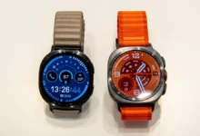Samsung Galaxy Watch 9 and Galaxy Watch Ultra 2 displayed side by side with their watch faces turned on.