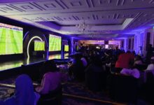 Samsung demonstrates Mini LED, OLED and Vision AI televisions during a football showcase at its 2026 TV launch event in Nairobi as attendees compare picture quality across multiple displays.