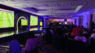 Samsung demonstrates Mini LED, OLED and Vision AI televisions during a football showcase at its 2026 TV launch event in Nairobi as attendees compare picture quality across multiple displays.