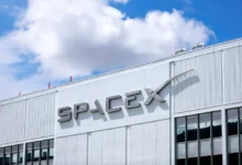 Exterior of a SpaceX office building with the company's logo displayed on the facade following the launch of the new SpaceXAI brand.