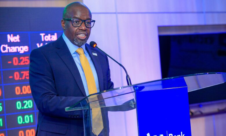 Tom Mulwa addresses delegates during the Nairobi Securities Exchange listing ceremony for I&M Group PLC's Medium Term Note.