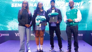 Visa and Safaricom representatives pose with winners at the Game Iko On event promoting the M-Pesa GlobalPay Virtual Visa Card.