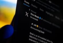 A smartphone displaying the X app with Elon Musk's profile and a Grok announcement on screen.