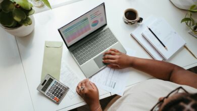 Financial records on a laptop representing trust ownership and beneficial ownership compliance in Kenya