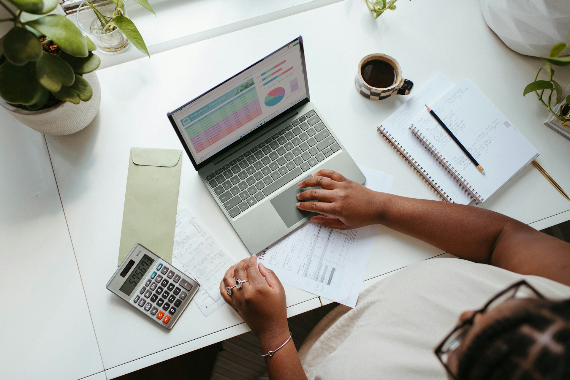Financial records on a laptop representing trust ownership and beneficial ownership compliance in Kenya