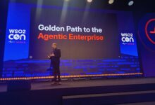 Asanka Abeysinghe delivering a keynote presentation titled "Golden Path to the Agentic Enterprise" on stage at WSO2Con Africa in Nairobi.