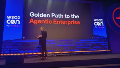 Asanka Abeysinghe delivering a keynote presentation titled "Golden Path to the Agentic Enterprise" on stage at WSO2Con Africa in Nairobi.