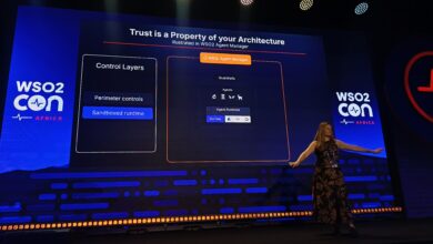 Dr. Rania Khalaf presenting on stage at WSO2Con Africa 2026 in front of a slide titled 'Trusted AI Governance Needs 3 Things' showing pillars for built-in controls, AI heterogeneity, and innovation.