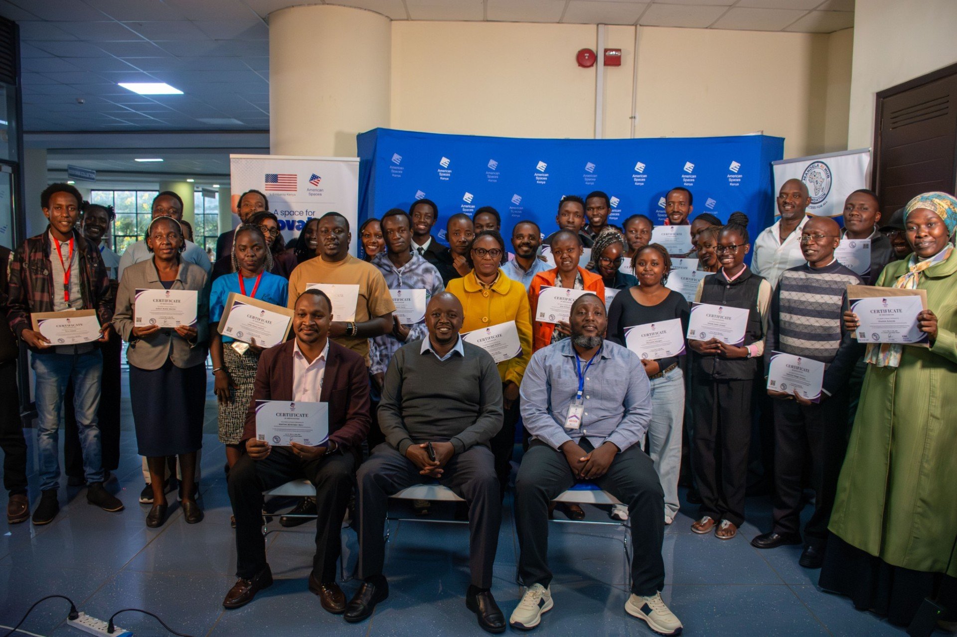 Kenyans holding certificates after AI and digital skills training
