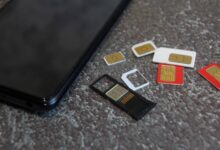 SIM cards and smartphone illustrating mobile number recycling in Kenya