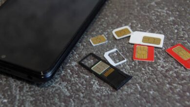 SIM cards and smartphone illustrating mobile number recycling in Kenya