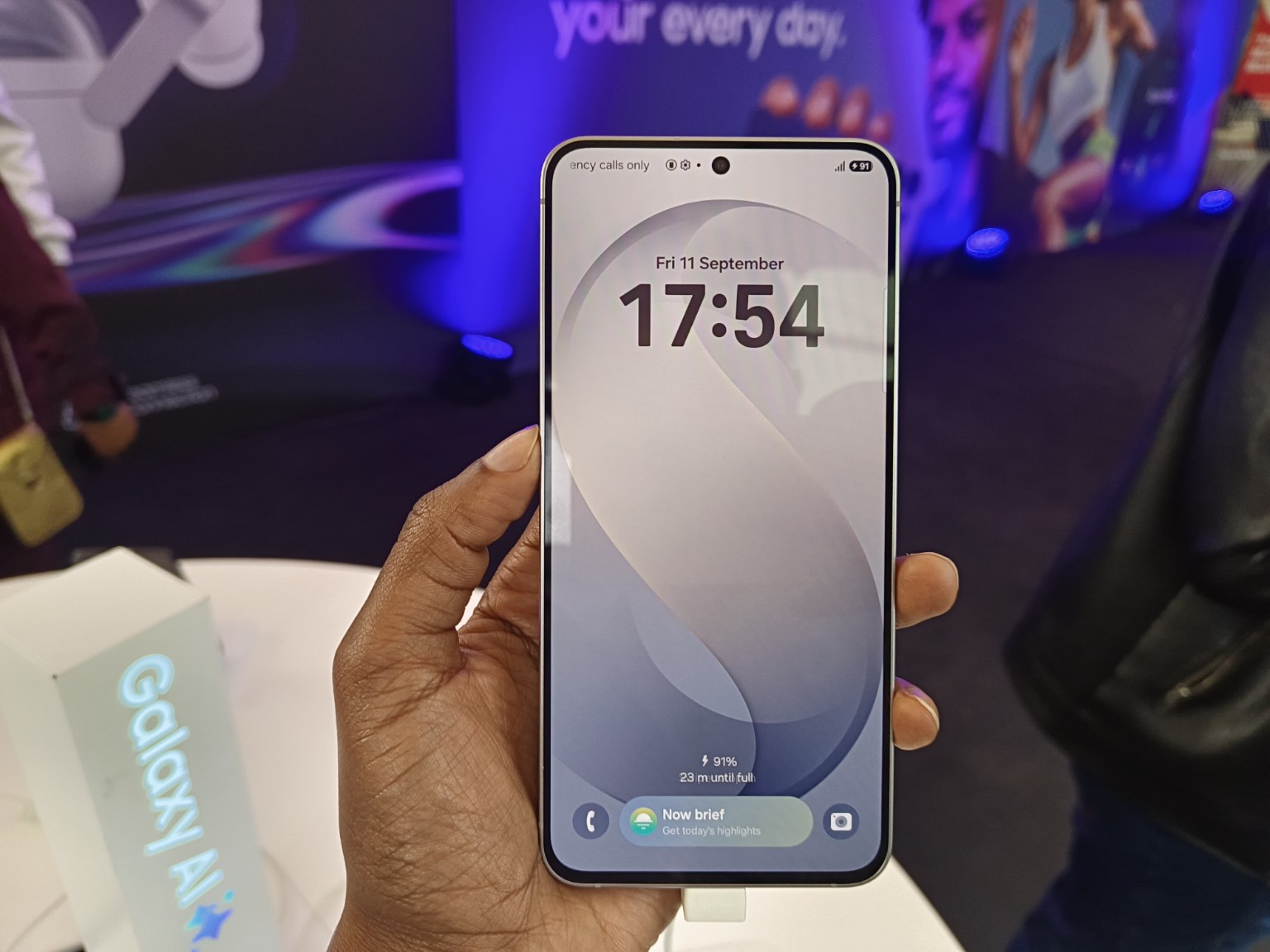 Samsung Galaxy phone displaying Now Brief with the One UI 9 update.