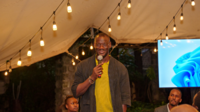 Big Cabal Media CEO Tomiwa Aladekomo speaks at TechCabal's Road to Moonshot mixer in Nairobi.