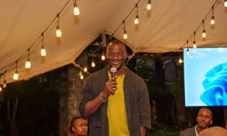 Big Cabal Media CEO Tomiwa Aladekomo speaks at TechCabal's Road to Moonshot mixer in Nairobi.