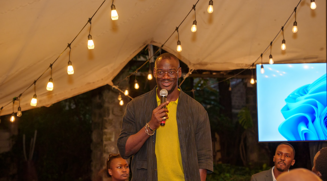 Big Cabal Media CEO Tomiwa Aladekomo speaks at TechCabal's Road to Moonshot mixer in Nairobi.