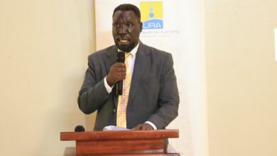 Uganda Revenue Authority official speaking at a tax compliance engagement