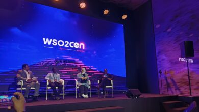 Panel discussion at WSO2Con Africa featuring Tonny Bbosa, Harrison Chapu, Hamda Al Issaei, and Dev Wijewardane discussing AI implementation in government and public services in Nairobi.