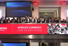 Airtel Money executives and London Stock Exchange CEO Julia Hoggett on the LSE balcony during the market-opening ceremony for the Airtel Money IPO.