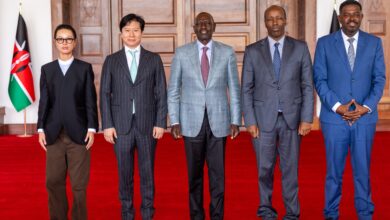 President William Ruto standing with Endelevu Enterprise Corporation and government delegates during the KSh390B green mobility MoU signing in Nairobi.