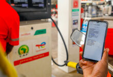 M-PESA Jumbe payment confirmation SMS showing a customer’s JumbeID and transaction details without exposing their full phone number or balance.