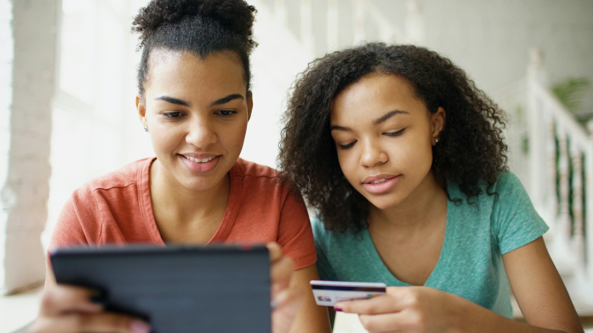 Teenager using an AI assistant to research products and compare shopping options online.